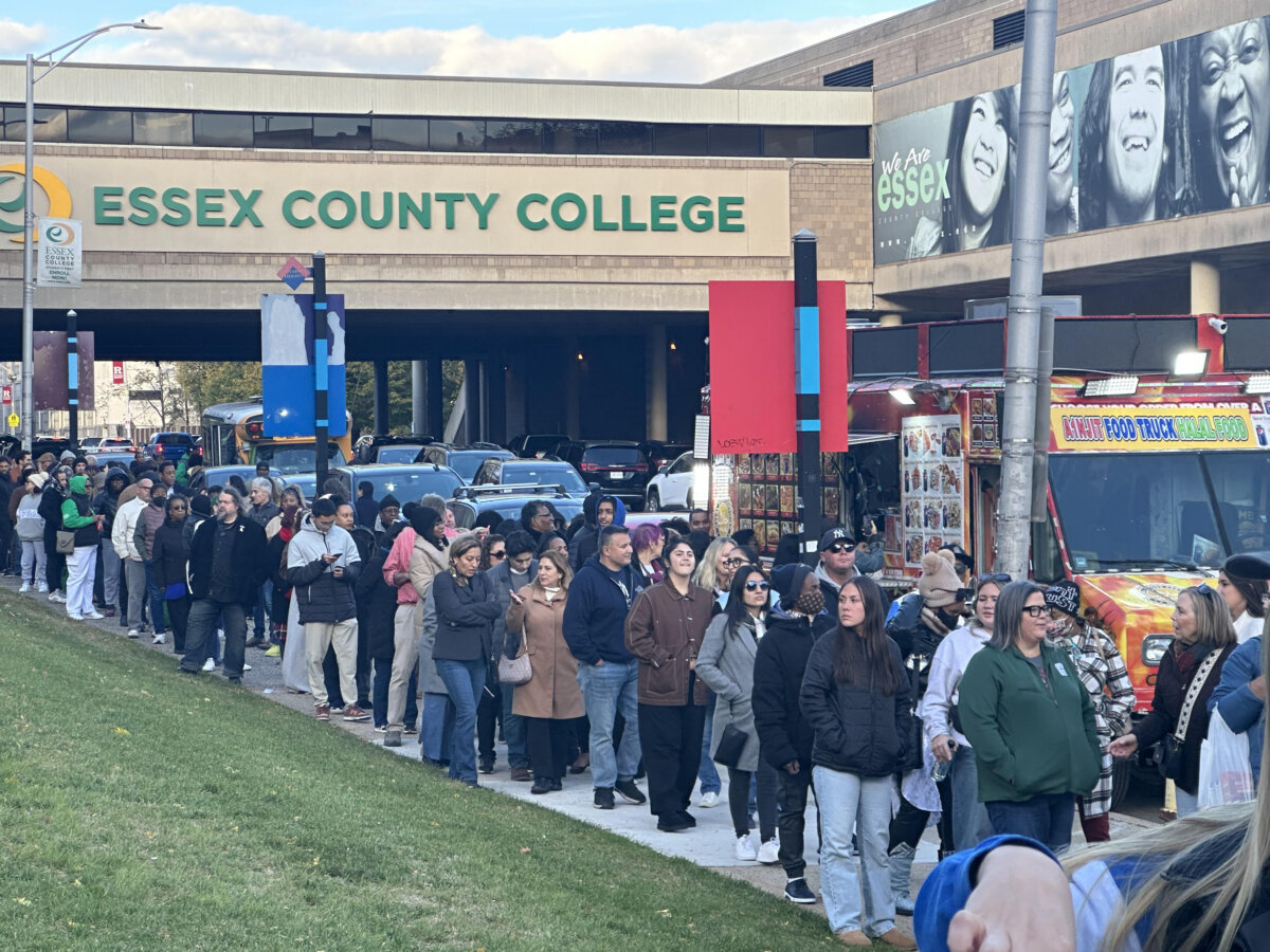 People line up outside Essex County College to hear gubernatorial candidate Mikie Sherrill speak in Newark, N.J., on Nov. 1, 2025. (Juliette Fairley/The Epoch Times)
