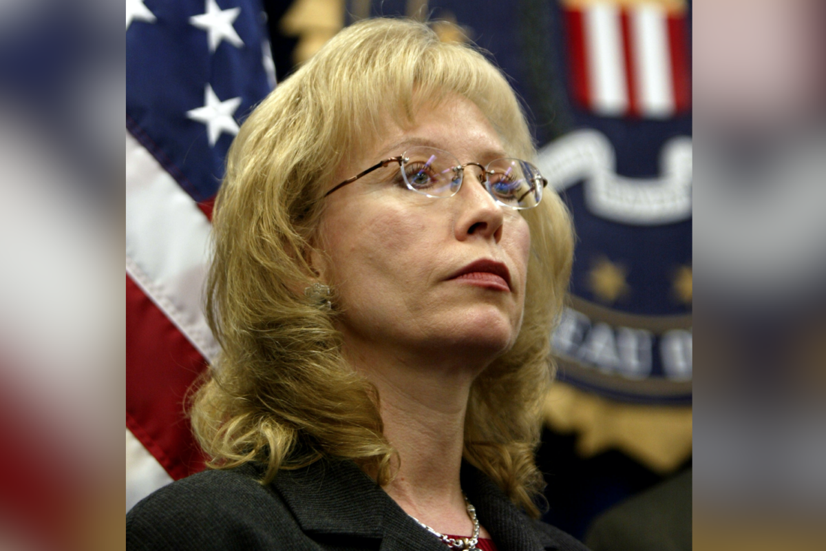 FBI Cyber Division Assistant Director Jana Monroe attends a news conference to unveil an FBI anti-piracy seal and warning text, to be displayed on digital and software intellectual property, in Los Angeles on Feb. 19, 2004. (David McNew/Getty Images)