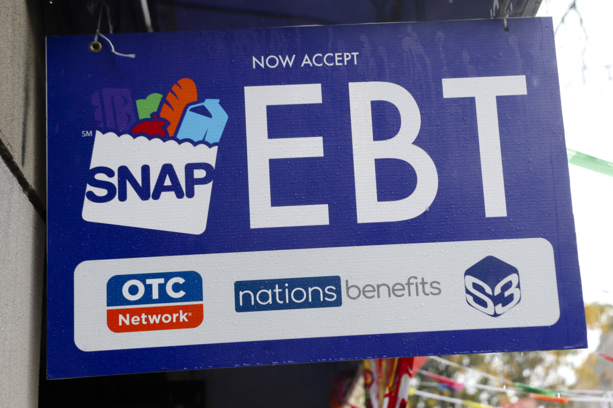 An EBT sign is displayed on the window of a grocery store in the Flatbush neighborhood of the Brooklyn borough in New York City, on Oct. 30, 2025. (Michael M. Santiago/Getty Images)