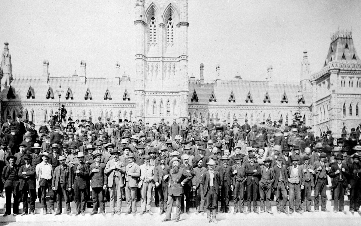The voyageurs, members of the Canadian Nile Contingent, pose in front of the Parliament Buildings in Ottawa in 1884. British Gen. Garnet Wolseley, who had served in Canada from 1861 to 1870, led the Nile Expedition of 1884–85 in an attempt to rescue Gen. Charles Gordon. (CP Photo/National Archives of Canada)