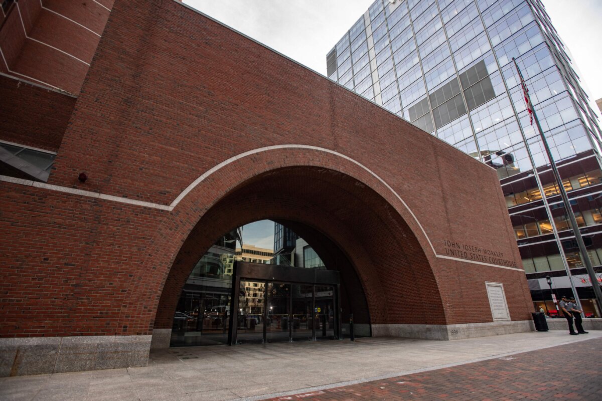 Security guards walk the by the entrance to the John Joseph Moakley United States Courthouse, in Boston, Mass., on April 14, 2023. (Joseph Prezioso/AFP via Getty Images)