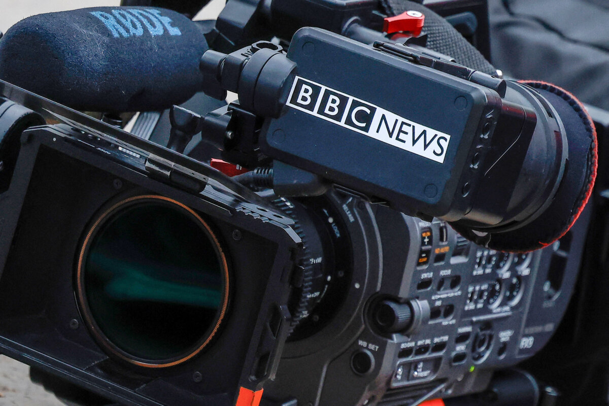 A BBC News camera kit resting on the floor outside La Sante prison in Paris on Nov. 10, 2025. (Ian Langsdon/AFP)