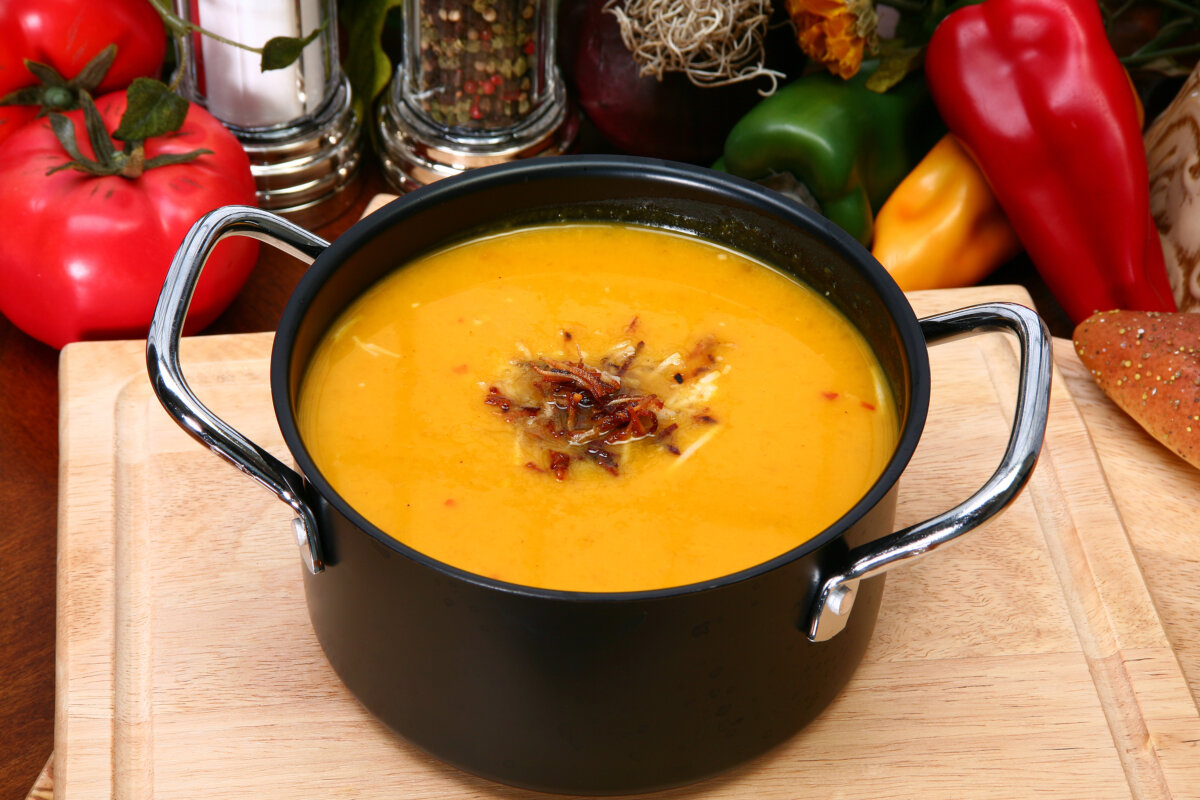 Butternut squash soup sprinkled with toasted coconut. (Dreamstime/TNS)