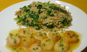 Ginger Citrus Flavored Scallops With Rice and Spinach