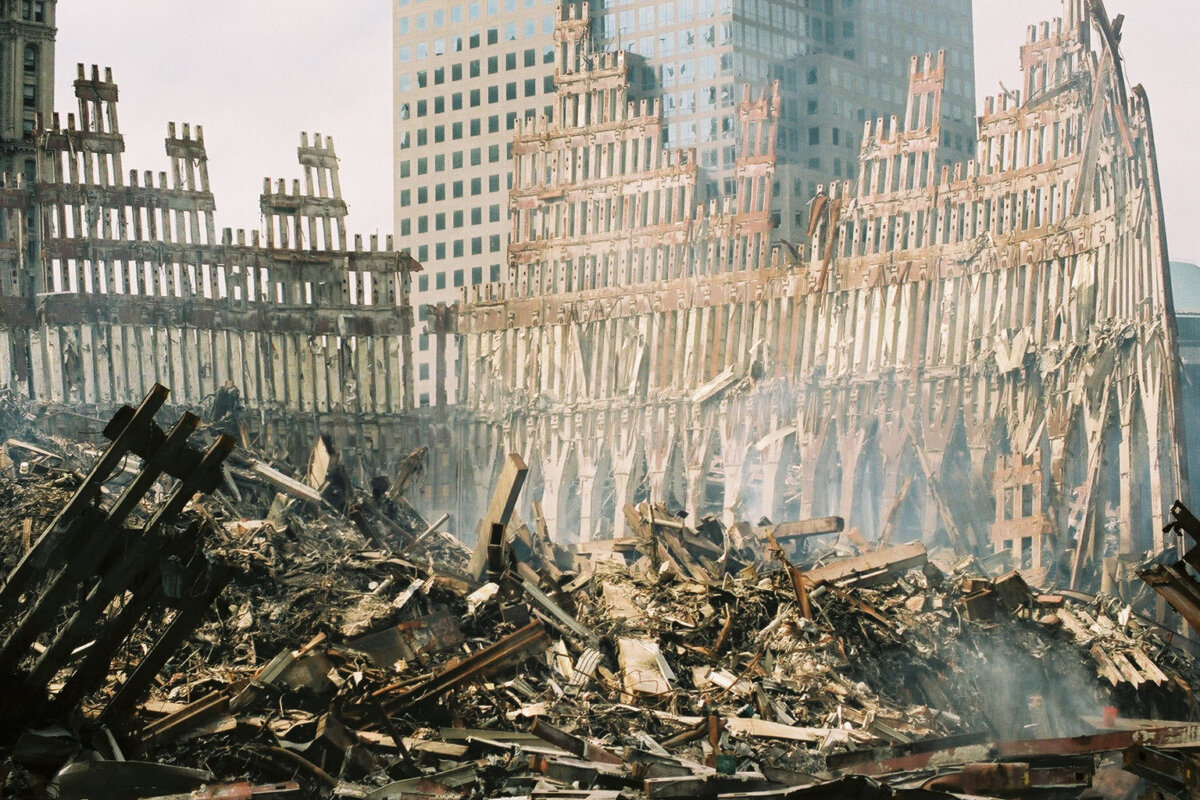 The remaining section of the World Trade Center is surrounded by a mountain of rubble following the Sept. 11 terrorist bombing attacks. (Bri Rodriguez/FEMA News Photo)