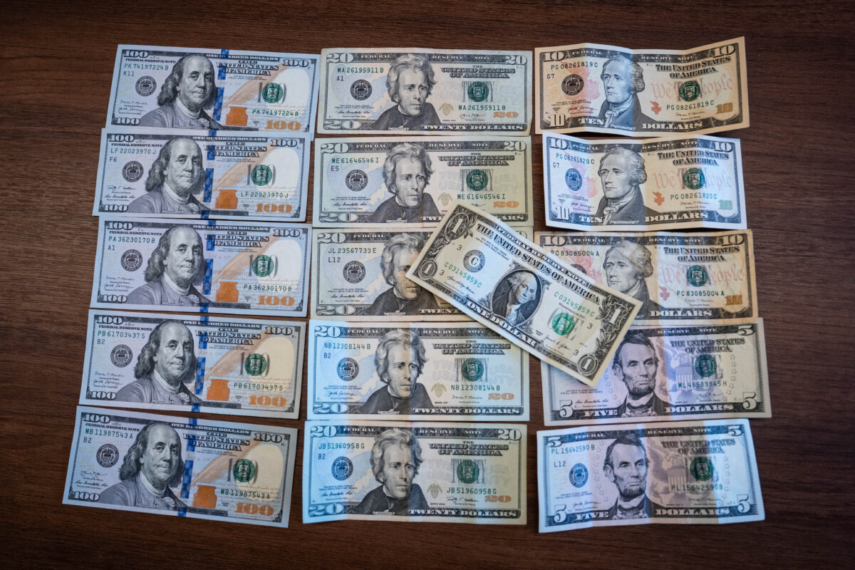 U.S. dollar bills in Washington on Nov. 13, 2025. (Madalina Kilroy/The Epoch Times)