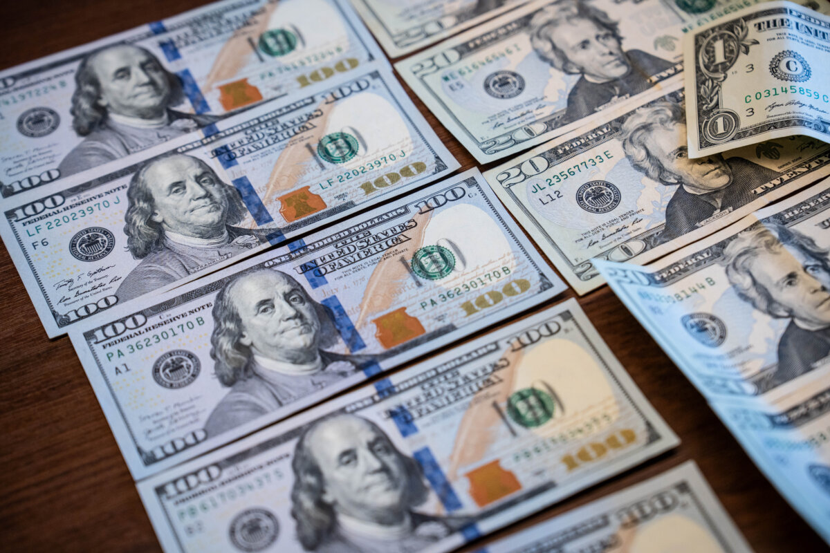 U.S. dollar bills in Washington on Nov. 13, 2025. (Madalina Kilroy/The Epoch Times)
