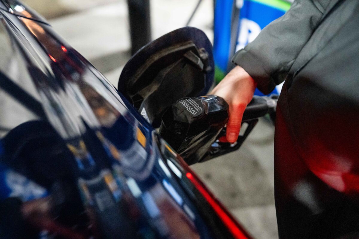 A man pumps gas at a station in Elkridge, Md., on Nov. 12, 2025. (Madalina Kilroy/The Epoch Times)