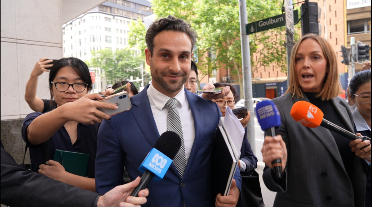 Michael Korn, Yang’s solicitor, talked to media reporters outside the Downing Centre Local Court in Sydney, Australia on Nov. 14. (Wang Nan/NTD)