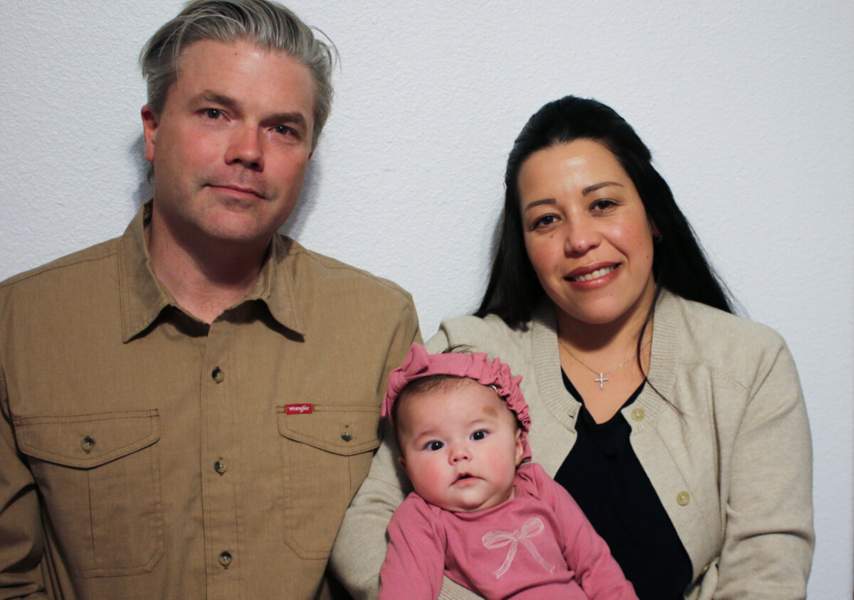 Stephen and Yurany Dexter hold their 4-month-old daughter, who was recently hospitalized for botulism, at their home in Flagstaff, Ariz., on Nov. 12, 2025. (Cheyanne Mumphrey/AP Photo)