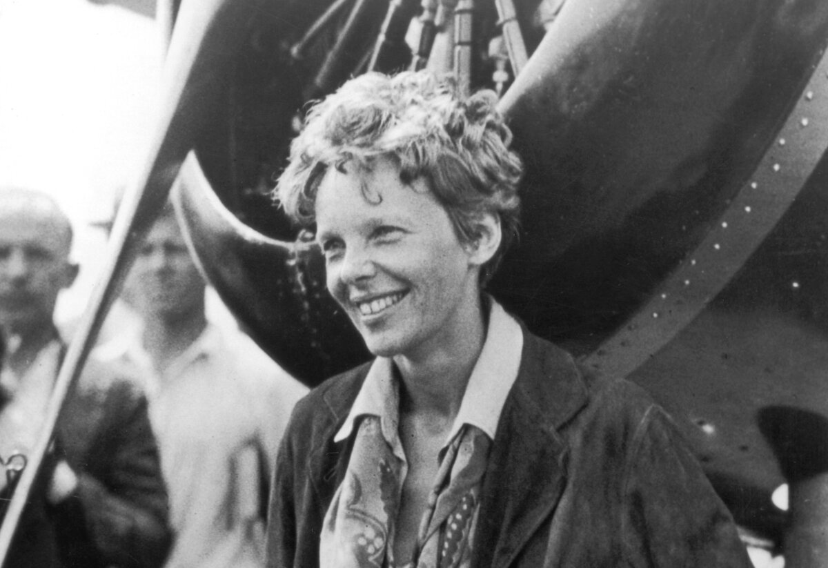American aviator Amelia Earhart exits her aircraft at Derry, Ireland, after her solo transatlantic flight, in 1932. (FPG/Hulton Archive/Getty Images)