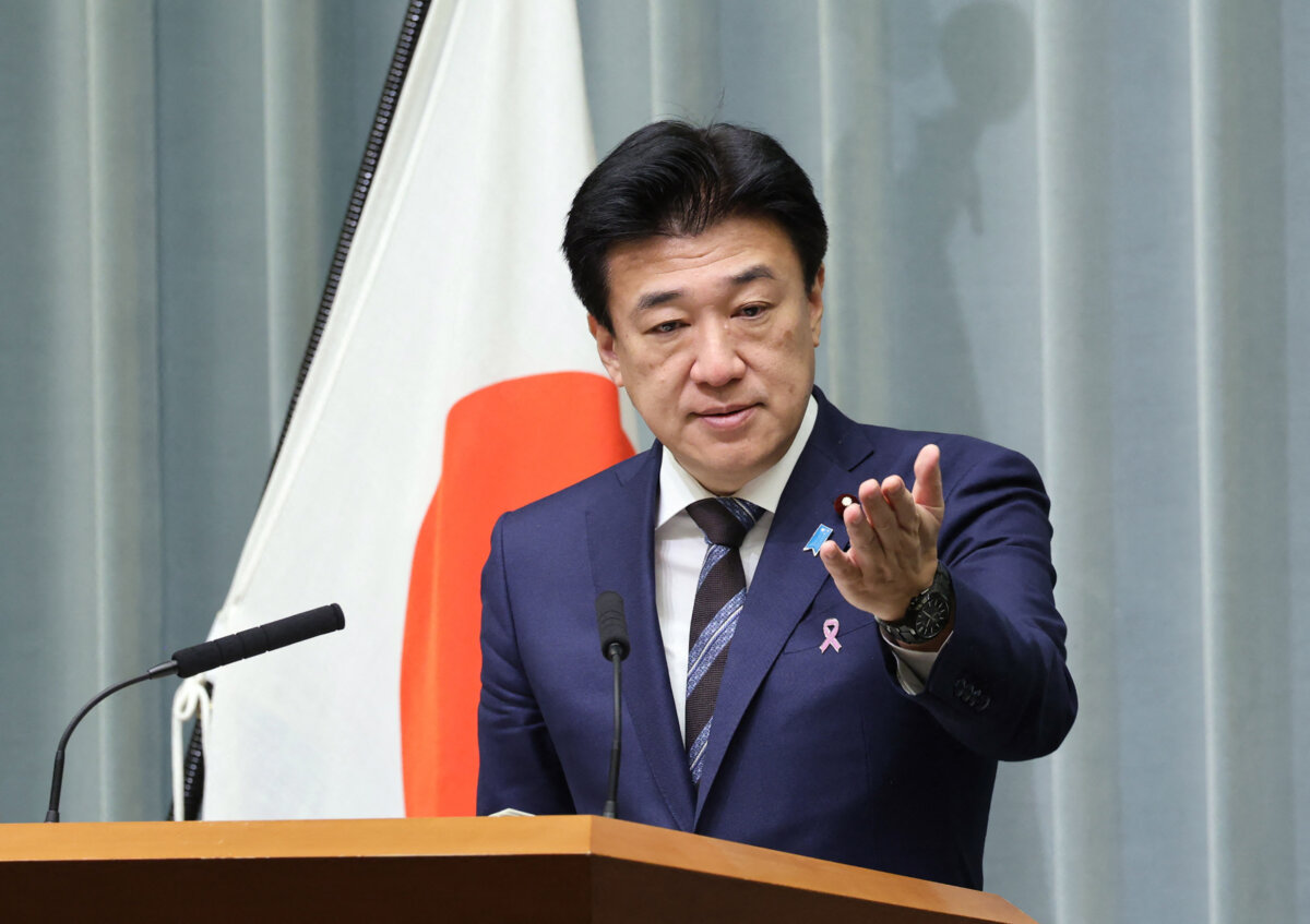 Japan's Chief Cabinet Secretary Minoru Kihara holds a press conference at the Prime Minister's Office in Tokyo on Nov. 17, 2025. (STR/JIJI Press/AFP via Getty Images)