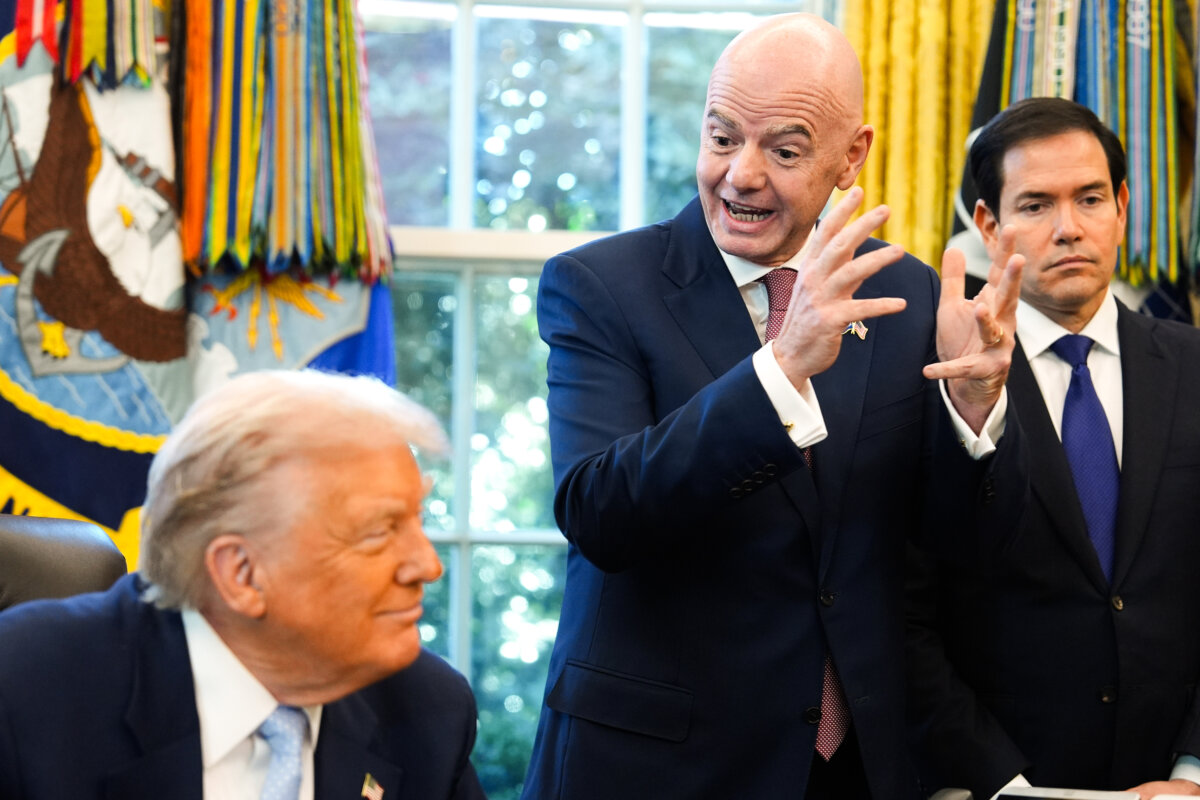 President Donald Trump and Secretary of State Marco Rubio listen as FIFA President Gianni Infantino speaks during a meeting with the White House task force on the 2026 FIFA World Cup in the Oval Office of the White House in Washington, on Nov. 17, 2025. (AP Photo/Evan Vucci)
