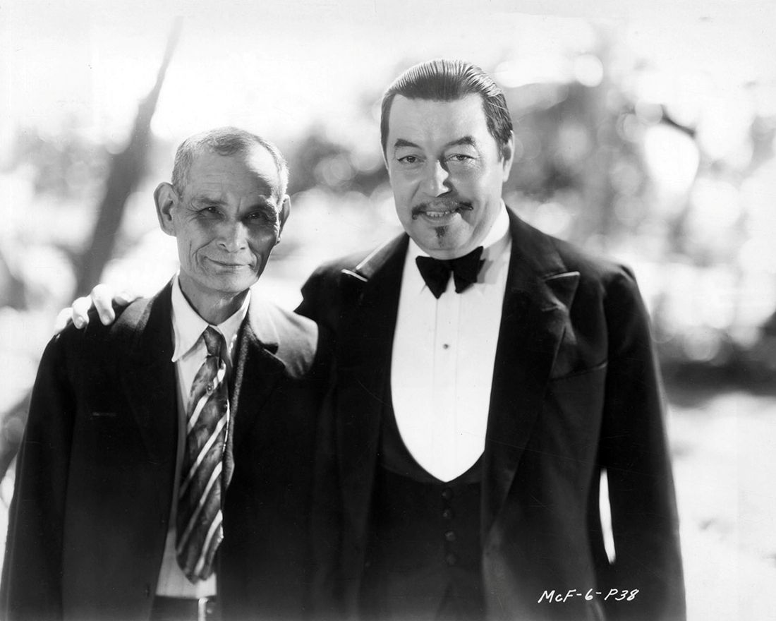 Chang Apana with Warner Oland on the set of “The Black Camel” in Honolulu, May 1931. Apana inspired the fictional detective Charlie Chan. (Fox Film Corporation)