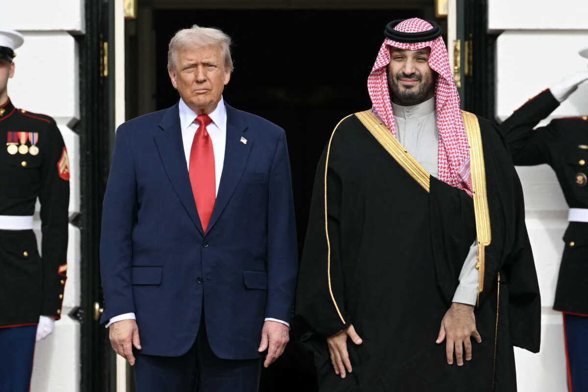 U.S. President Donald Trump greets the Kingdom of Saudi Arabia's Crown Prince Mohammed bin Salman on the South Lawn at the White House in Washington on Nov. 18, 2025. (Saul Loeb/AFP via Getty Images)