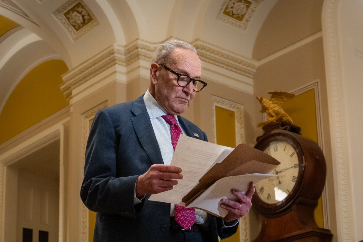 Senate Minority Leader Chuck Schumer (D-N.Y.) takes part in the weekly press conference on Capitol Hill in Washington on Nov. 19, 2025. (Madalina Kilroy/The Epoch Times)