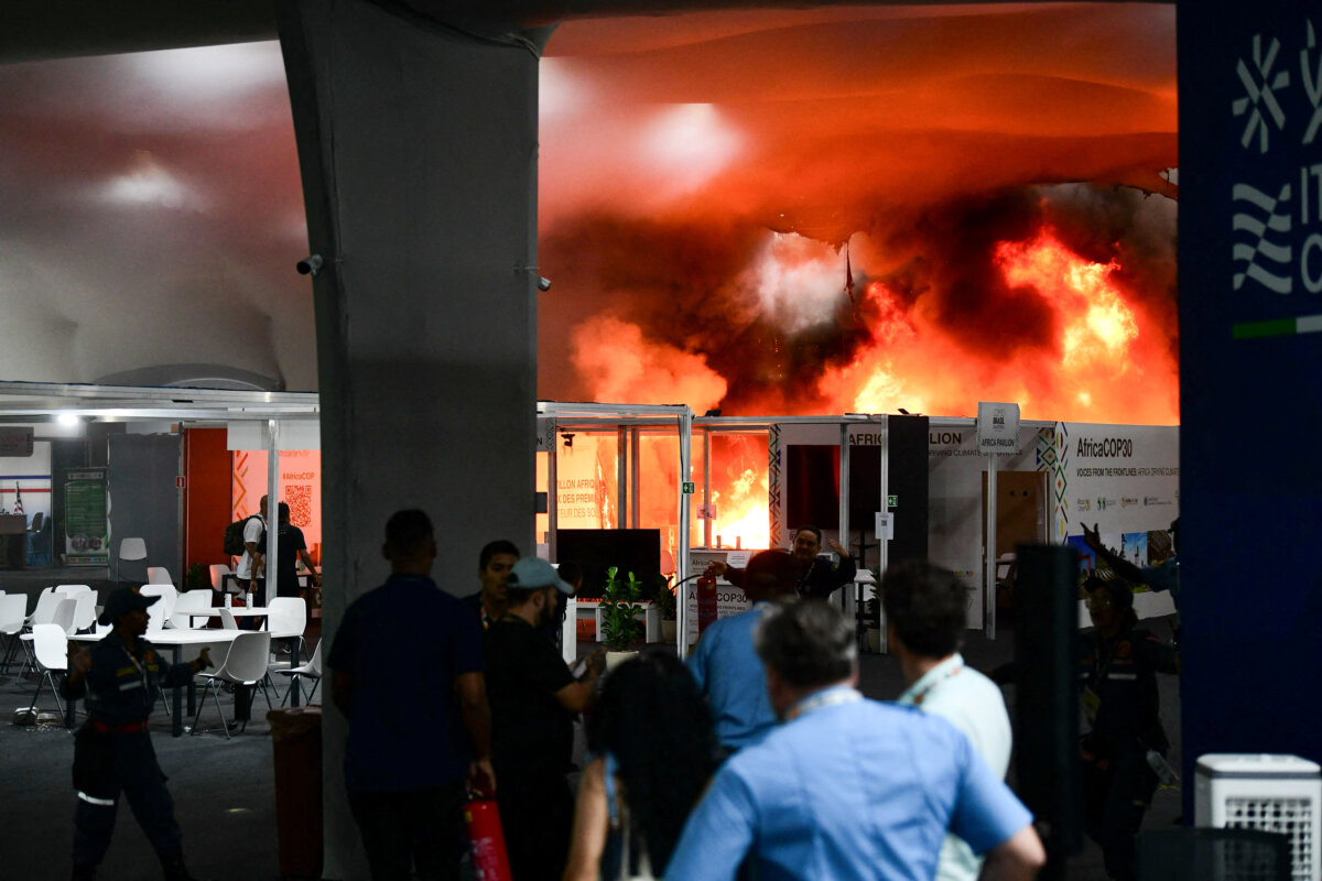 A fire burns in a pavilion during the COP30 UN Climate Change Conference in Belem, Para state, Brazil, on Nov. 20, 2025. (Jacqueline Lisboa/AFP via Getty Images)