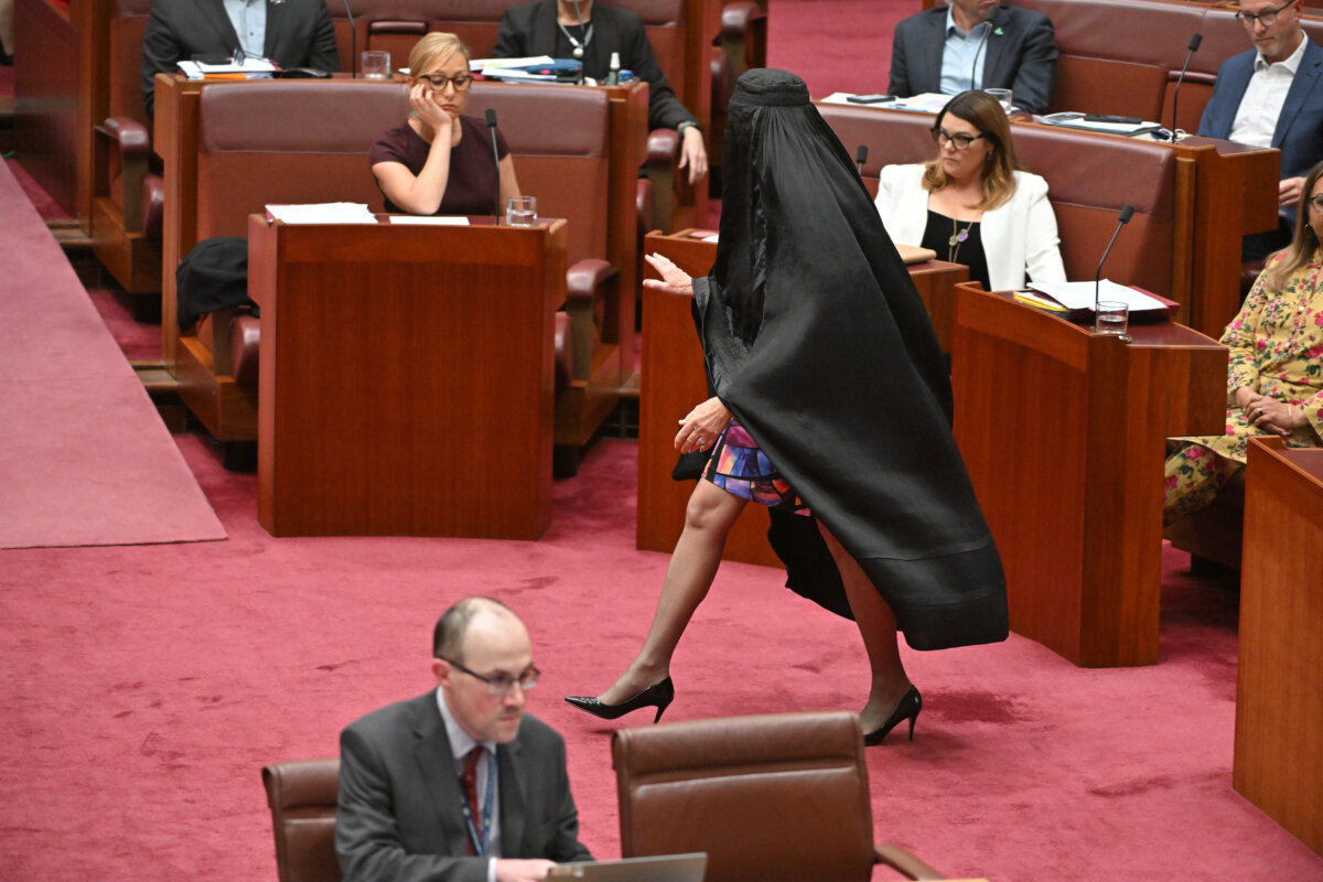 One Nation Leader Pauline Hanson wears a burqa in the Senate chamber at Parliament House in Canberra, Australia, on Nov. 24, 2025. (AAP Image/Mick Tsikas)