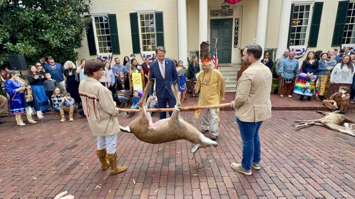 Virginia Gov. Glenn Youngkin accepts the tribute of a stag from the Mattaponi tribe at the Governor's Mansion in Richmond, Va., on Nov. 26, 2025. (Arjun Singh/The Epoch Times)