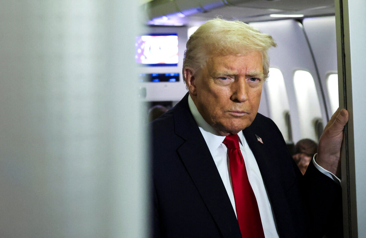 President Donald Trump looks on aboard Air Force One during travel to Palm Beach, Fla., from Joint Base Andrews, Md., on Nov. 25, 2025. (Anna Rose Layden/Reuters)