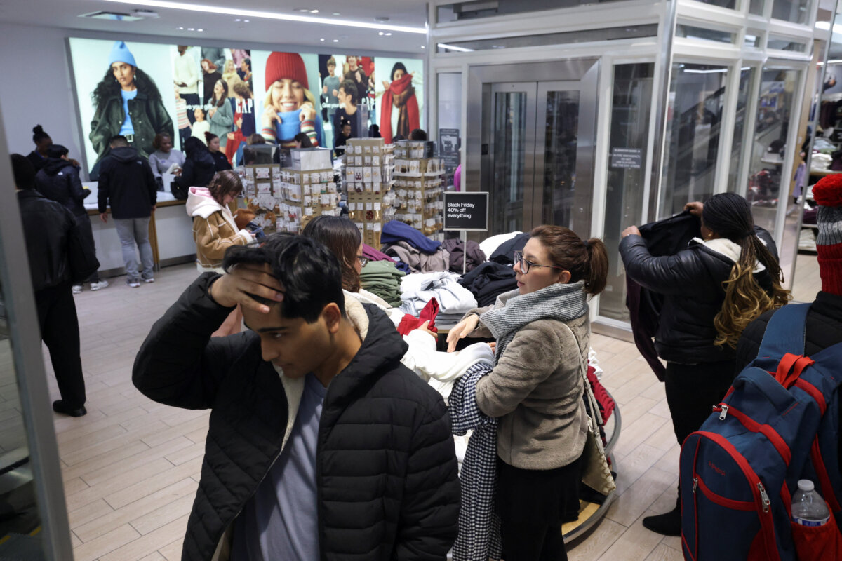 People shop ahead of Black Friday during Thanksgiving Day in New York City on Nov. 27, 2025. (Brendan McDermid/Reuters)