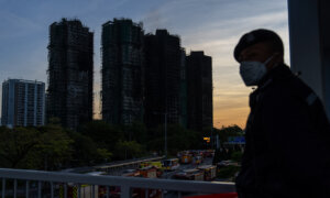 Hong Kong Student Arrested After Launching Petition Over Deadly Fire