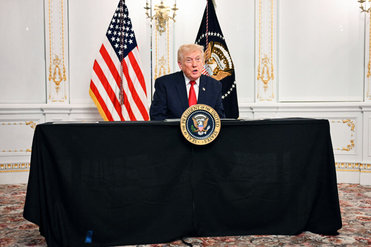 President Donald Trump participates in a video call with military service members from his Mar-a-Lago residence in Palm Beach, Fla., on Nov. 27, 2025. (Jim Watson/AFP via Getty Images)