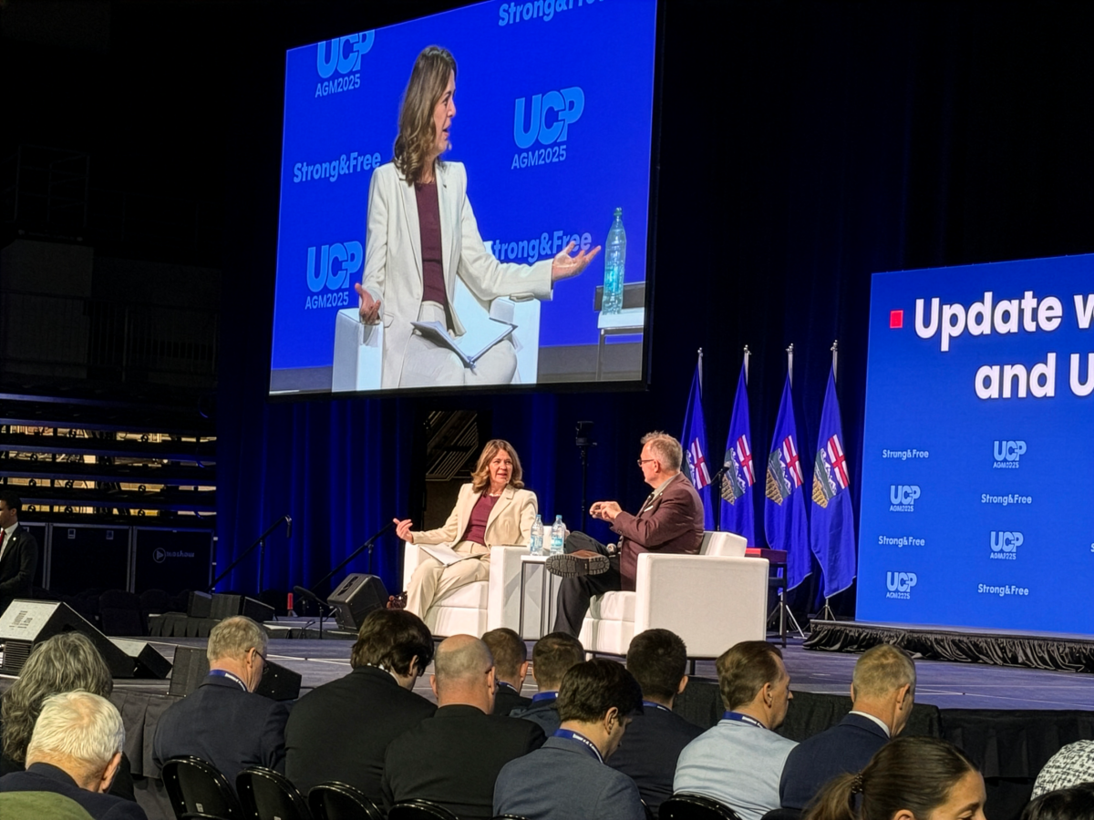 Alberta Premier Danielle Smith takes part in a panel discussion with UCP president Rob Smith at the annual UCP convention in Edmonton on Nov. 28, 2025. (The Epoch Times)