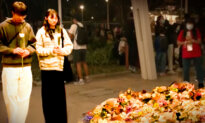 Floral Tributes Pour in After Deadly Hong Kong Blaze