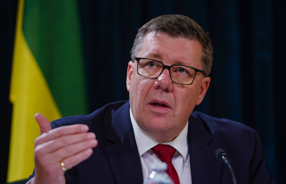Saskatchewan Premier Scott Moe gestures while speaking during a press conference before the speech from the throne, in Regina on Oct. 22, 2025. (The Canadian Press/Heywood Yu)
