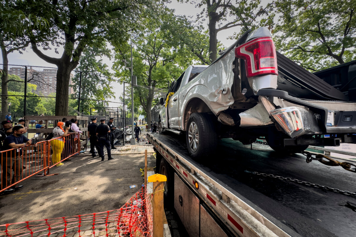 New York City authorities work a crime scene of a deadly crash Friday, July 5, 2024, in the Lower East Side neighborhood in New York. (AP Photo/John Minchillo, file)