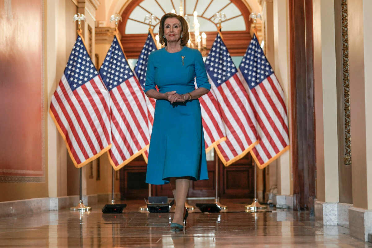House Speaker Nancy Pelosi (D-Calif.) arrives to speak about the House coronavirus bill on Capitol Hill in Washington on March, 13, 2020. (Scott Applewhite/AP Photo)