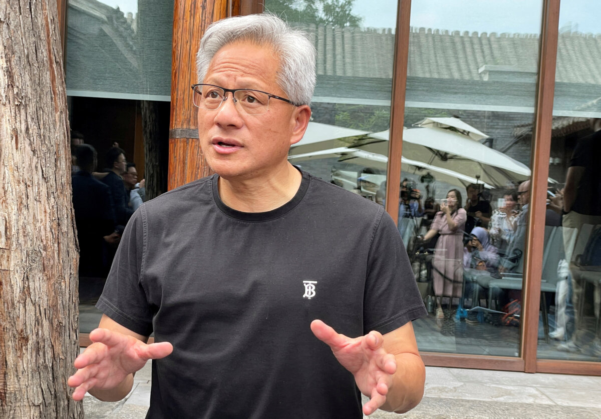 Nvidia CEO Jensen Huang speaks to the media at a hotel in Beijing on July 16, 2025. (Alessandro Diviggiano/Reuters)