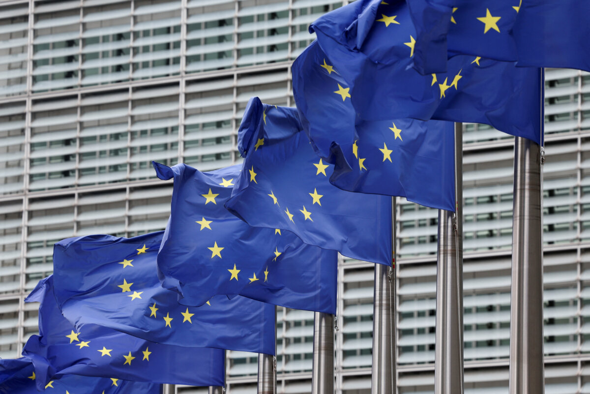 European Union flags flutter outside the European Union Commission headquarters in Brussels on July 16, 2025. (Yves Herman/Reuters)
