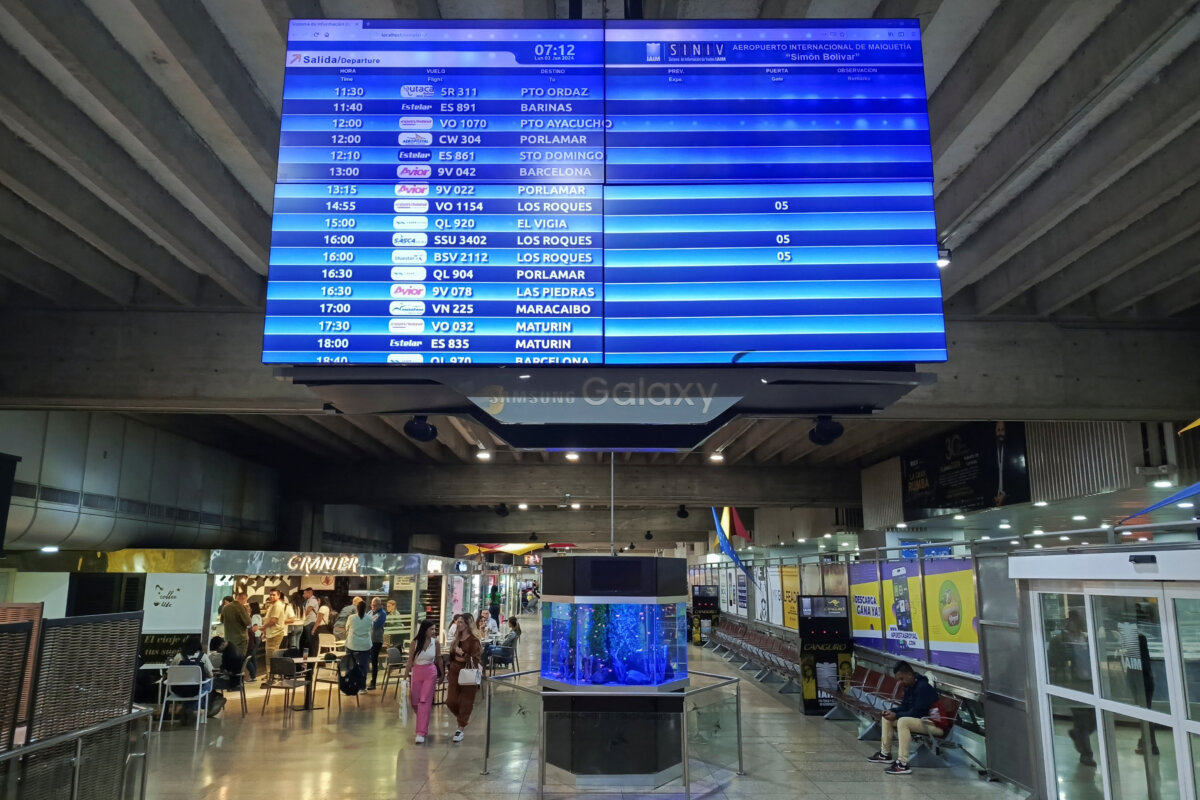 A departures and arrivals screen at the Simon Bolivar International airport in Maiquetía, La Guaira State, Venezuela, on June 3, 2024. (Leonardo Fernandez Viloria/Reuters)