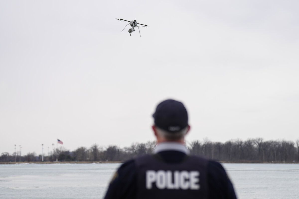 A drone flown by an RCMP officer in Windsor, Ont., hovers over the Detroit River, on March 7, 2025. (The Canadian Press/Chris Young)