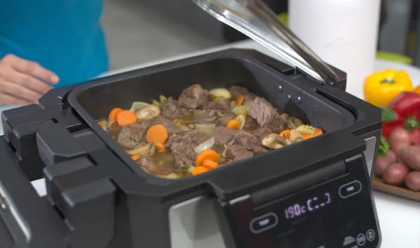 Gourmax Pro, the ultimate 11-in-1 multi-cooker, transforms into an indoor smokeless grill, air fryer, griddle, slow cooker, oven, steamer, dehydrator, panini press, toaster, pancake maker, and reheating station.