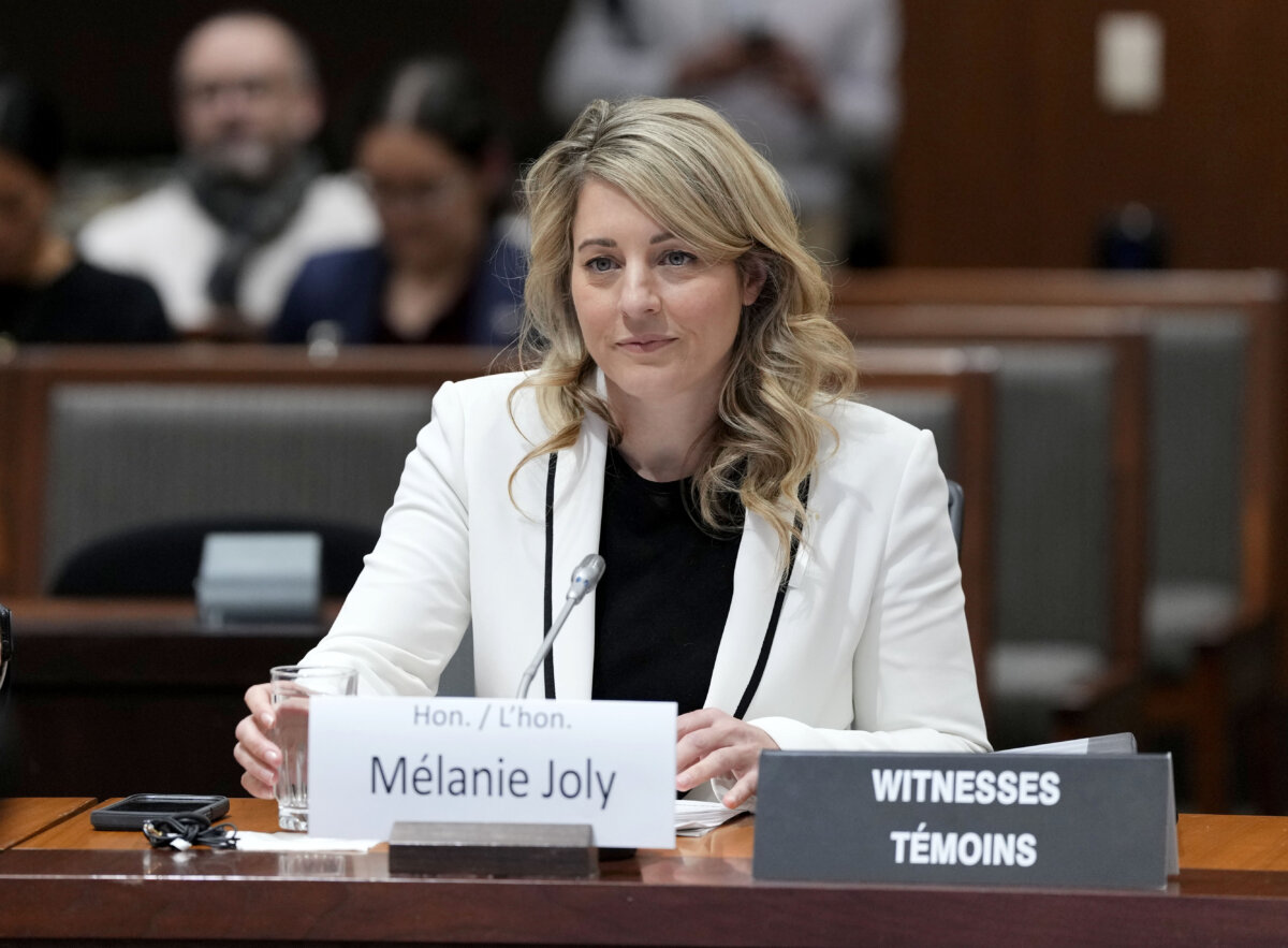 Minister of Industry Mélanie Joly prepares to appear before the Standing Committee on International Trade on Parliament Hill in Ottawa, on Dec. 4, 2025. (The Canadian Press/Justin Tang)