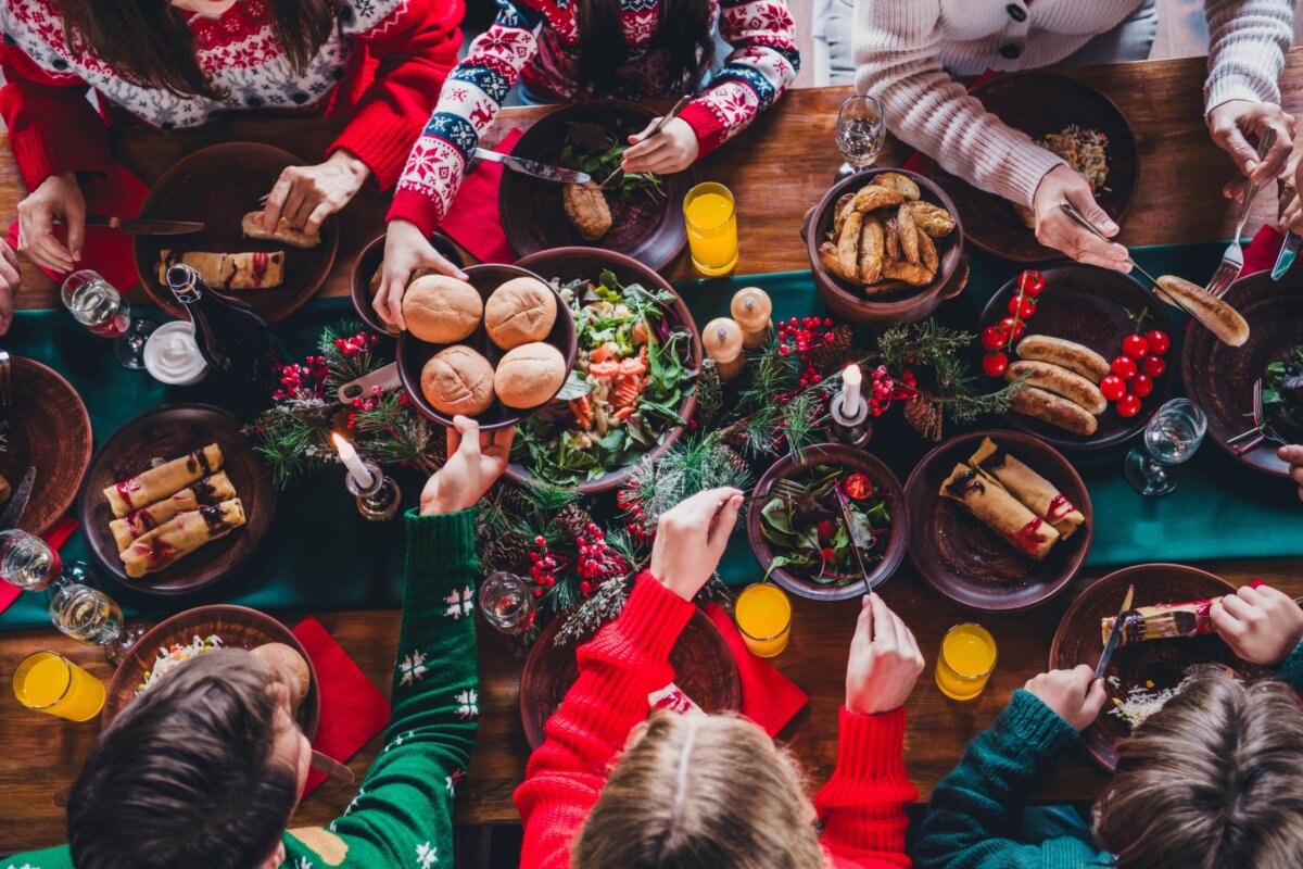 Christmas dinner is truly a joyous time for children and adults alike in L.M. Montgomery's "A Christmas Mistake." (Roman Samborskyi/Shutterstock)