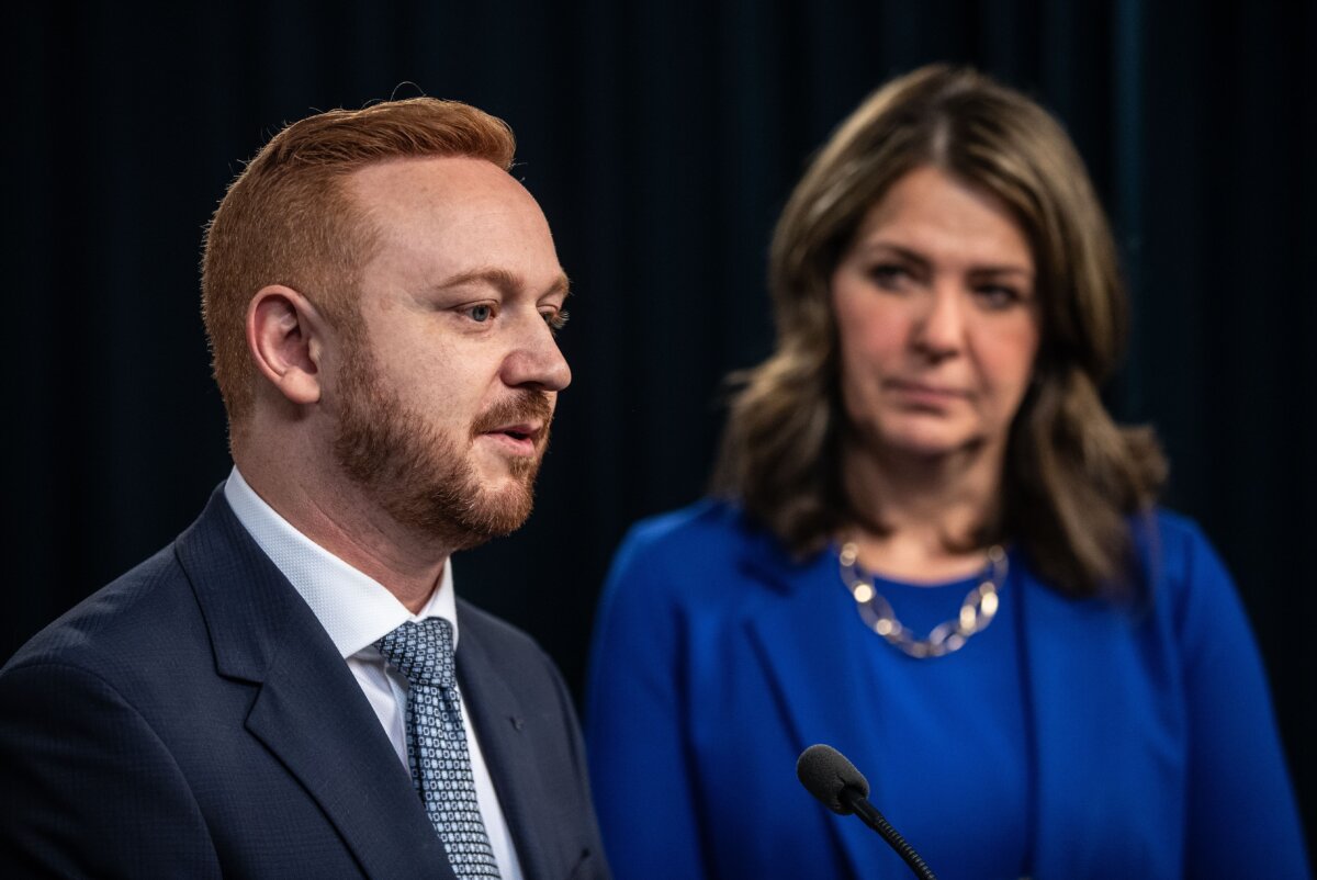 Alberta Premier Danielle Smith and Justice Minister Mickey Amery announce proposed changes to several pieces of democratic process legislation, in Edmonton on April 29, 2025. (The Canadian Press/Jason Franson)