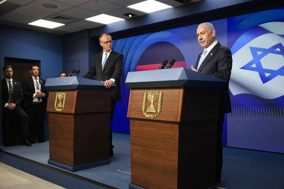 Israeli Prime Minister Benjamin Netanyahu (R) speaks during a joint press conference with German Chancellor Friedrich Merz in Jerusalem on Dec. 7, 2025. (Ariel Schalit/Pool/AFP via Getty Images)