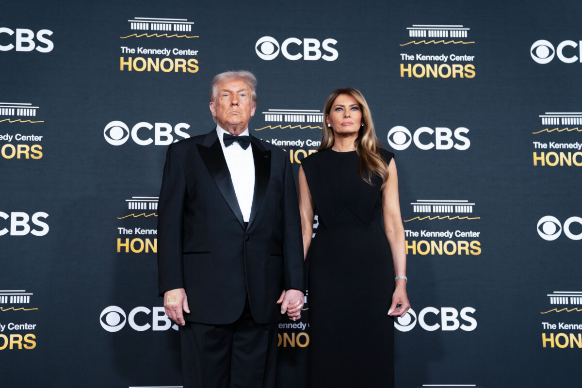 President Donald Trump and First Lady Melania Trump attend an event in Washington on Dec. 7, 2025. (Allison Robbert/Getty Images)
