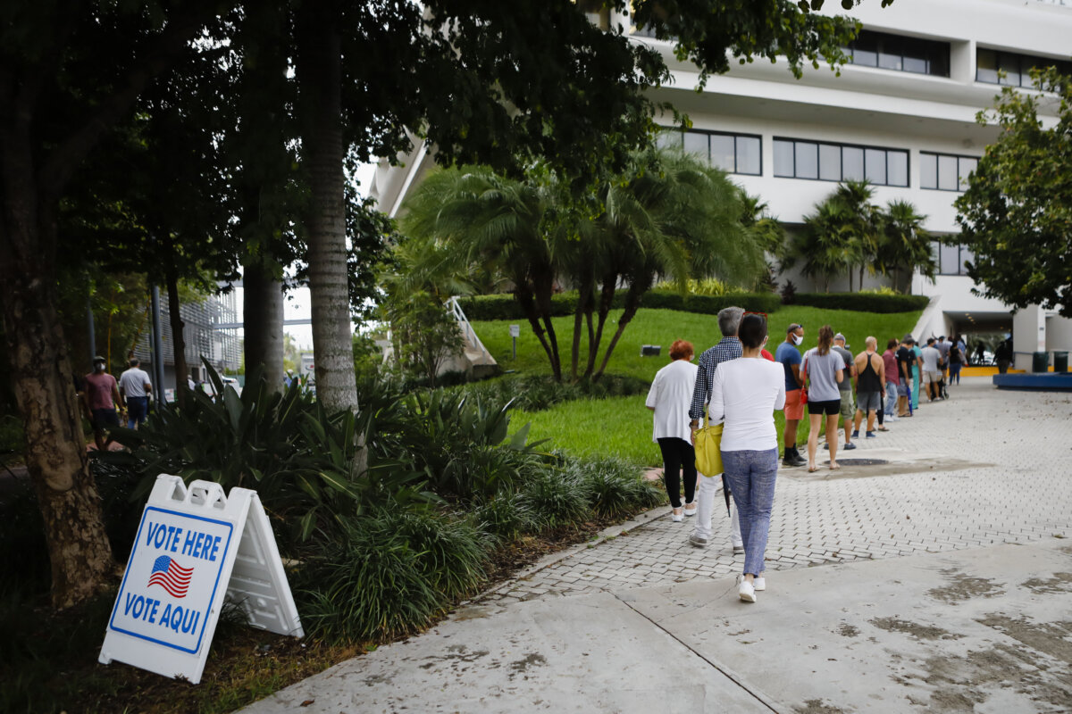 Voters wait to cast early ballots at Miami Beach City Hall on Oct. 19, 2020. (Eva Marie Uzcategui/AFP via Getty Images)