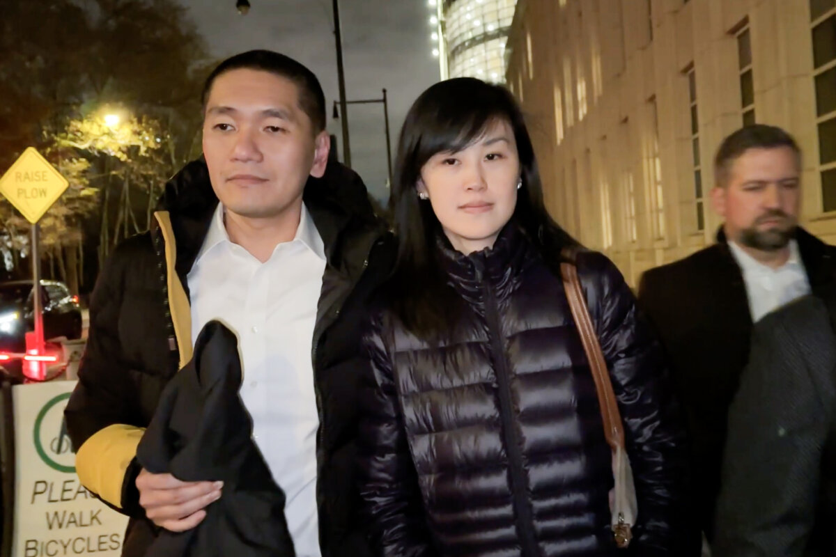 Linda Sun and her husband, Chris Hu, depart from the U.S. District Court for the Eastern District of New York in New York City on Nov. 19, 2025. (Flora Hua/NTD)