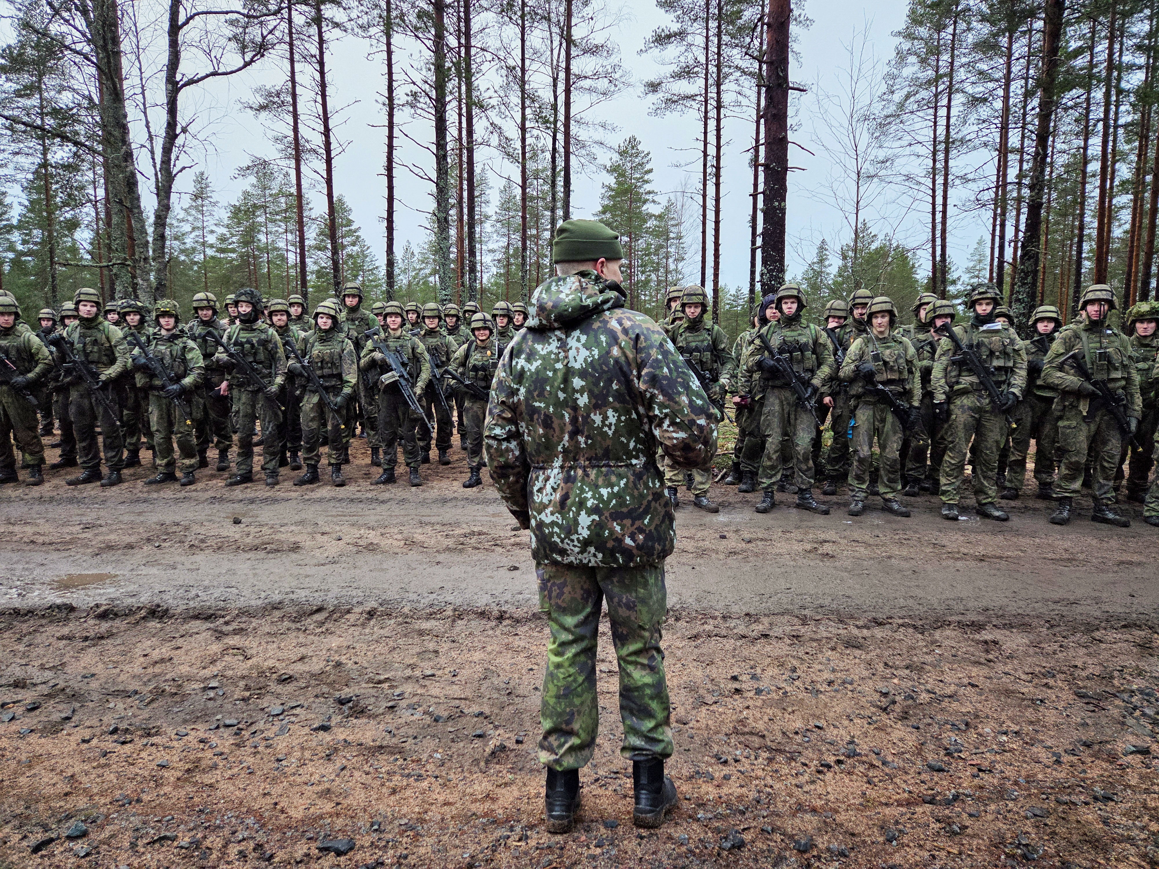 Commander of the Finnish Army Lieutenant General Pasi Valimaki addresses Finnish conscript soldiers after a military exercise at Pori Brigade in Niinisalo