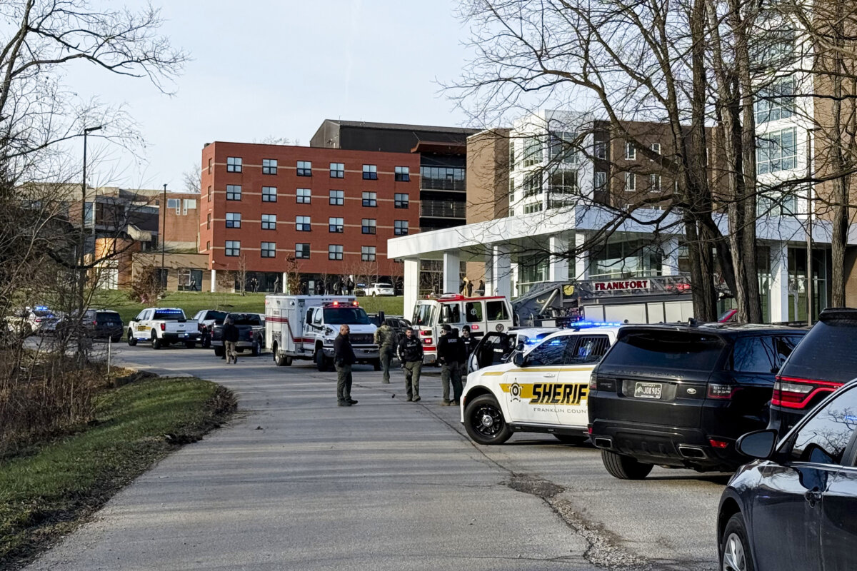 Law enforcement responds to a shooting at Whitney Moore Young Jr. Hall on Kentucky State University's campus in Frankfort, Ky., Tuesday, Dec. 9, 2025. (Hannah Brown/The State Journal via AP)