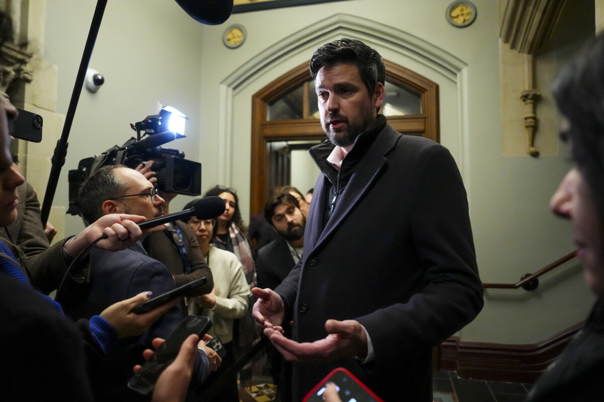 Justice Minister Sean Fraser arrives for a caucus meeting on Parliament Hill in Ottawa on Dec. 10, 2025. (The Canadian Press/Sean Kilpatrick)