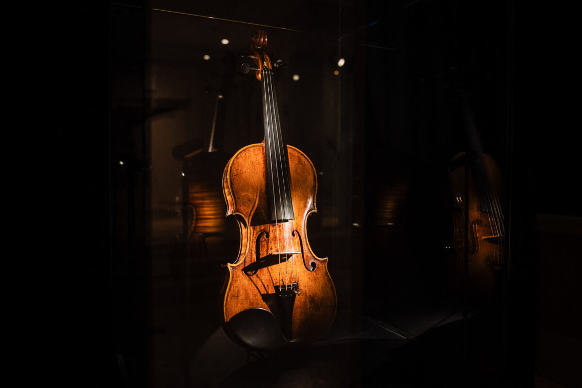 A rare violin, dating from 1727–1730 and signed by the famous Cremonese luthier Giuseppe Guarneri, known as del Gesù, is on display at in Paris on Dec. 11, 2025. Fritz Kreisler used the 1730 model himself. (Dimitar Dilkoff / AFP via Getty Images)