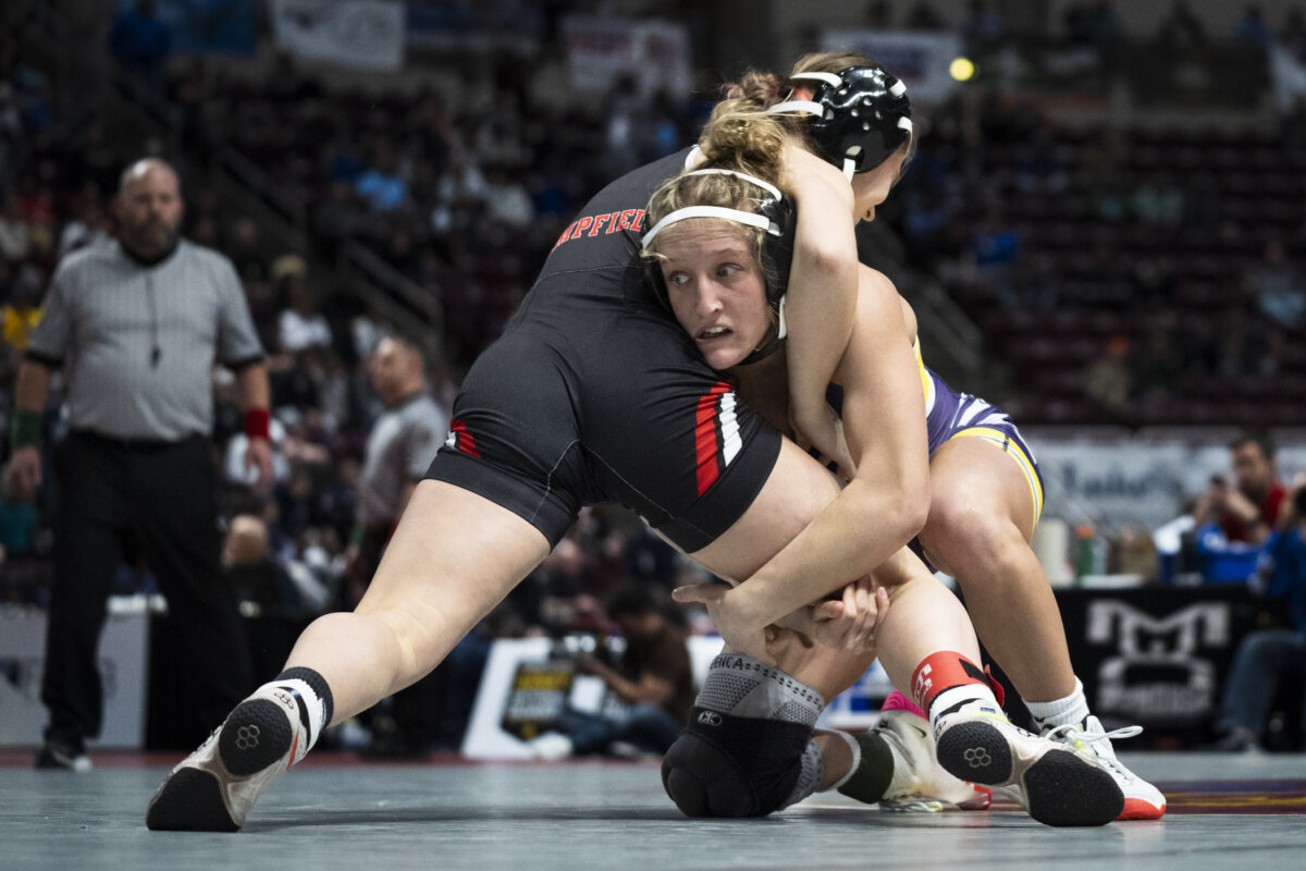 Palisades’ Savannah Witt, right, wrestles Hempfield’s Cleona O’Brien during the first found of the PIAA High School Wrestling Championships in Hershey, Pa., on March 7, 2024. Girls’ wrestling has become the fastest-growing high school sport in the country. (AP Photo/Matt Rourke)