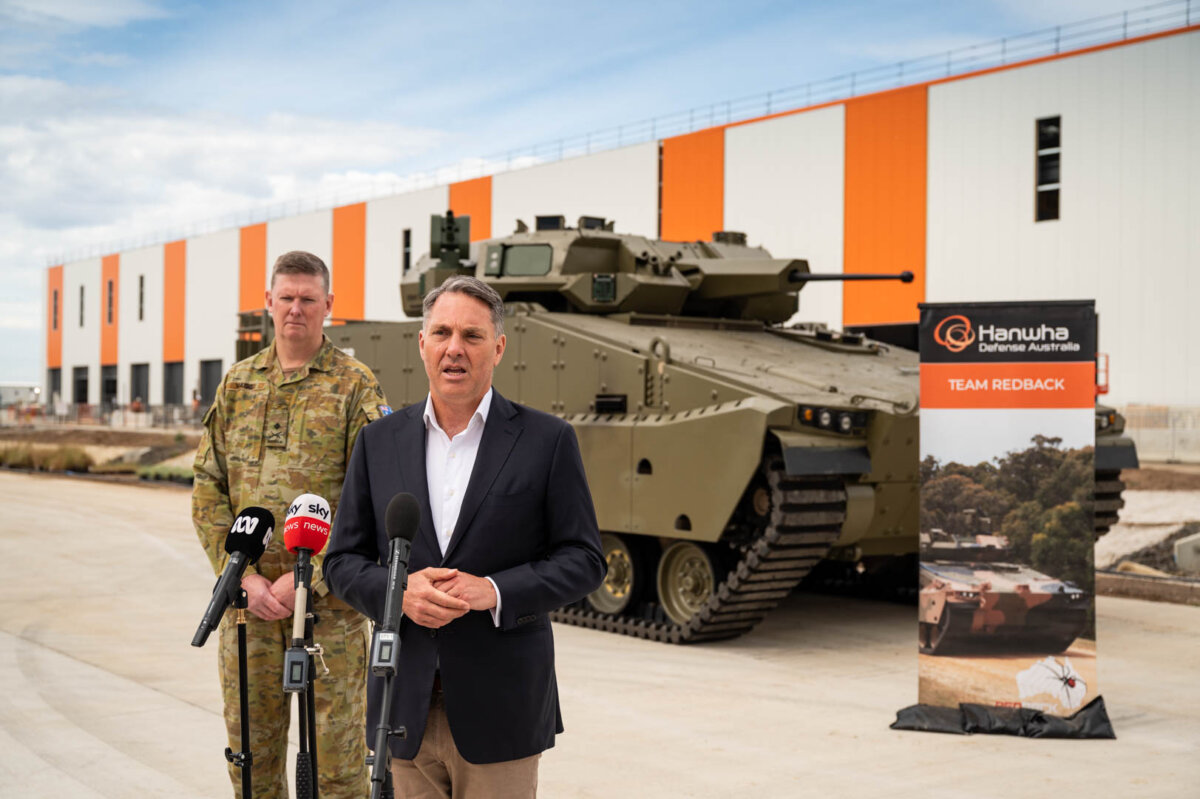 Australia's Defence Minister Richard Marles at the Hanwha Defence Australia headquarters in Geelong, announcing that the Commonwealth had signed an approximately $4 billion contract with the South Korean manufacturer for the delivery of 129 Redback Infantry Fighting Vehicles. (Courtesy of Hanwha Defence Australia.)
